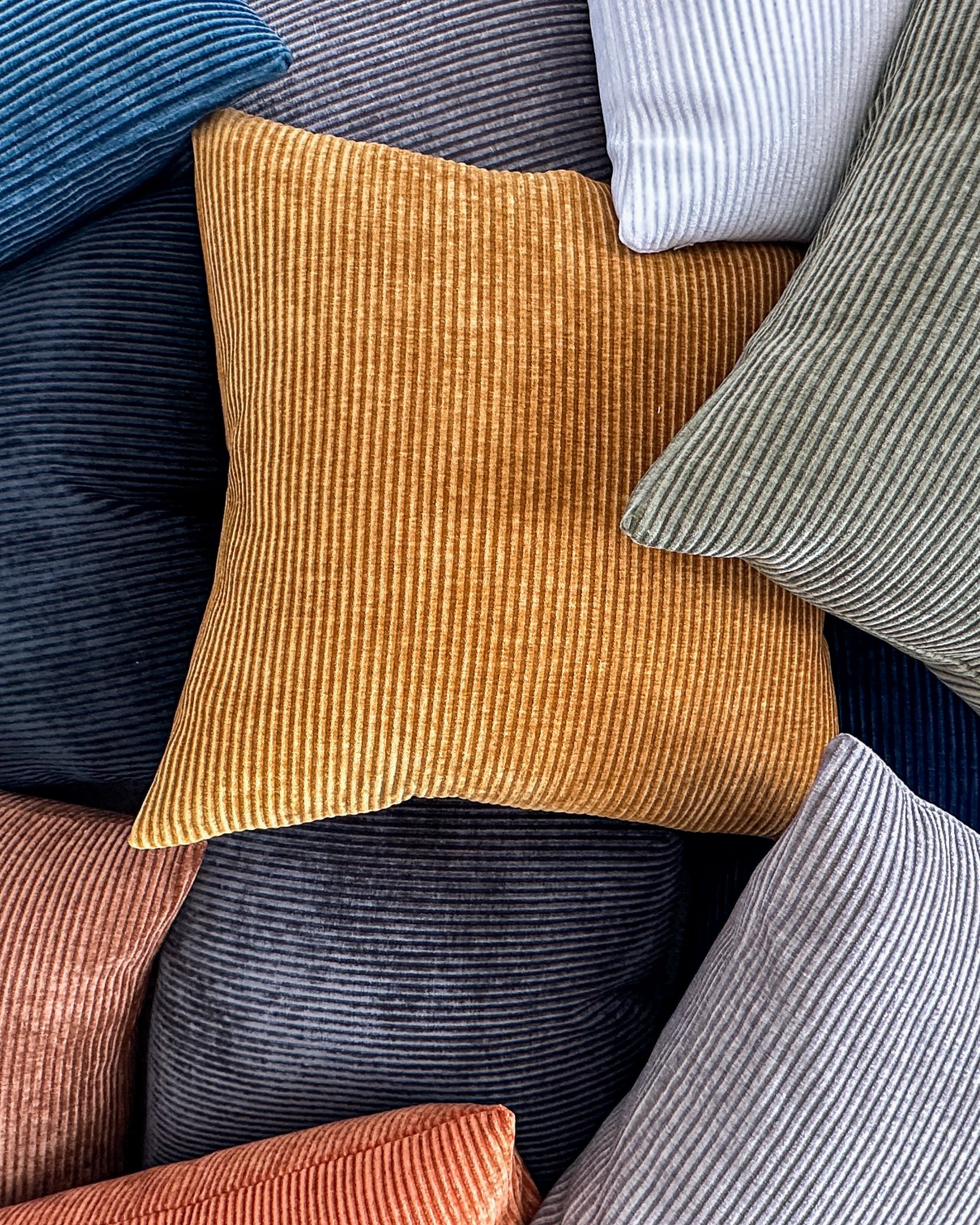 Corduroy accent pillow covers in varying shades