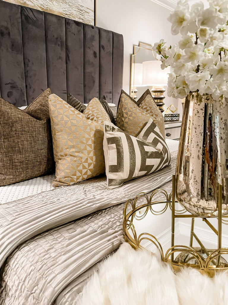 How to Create a Cozy Bedroom with Designer Throw Pillows